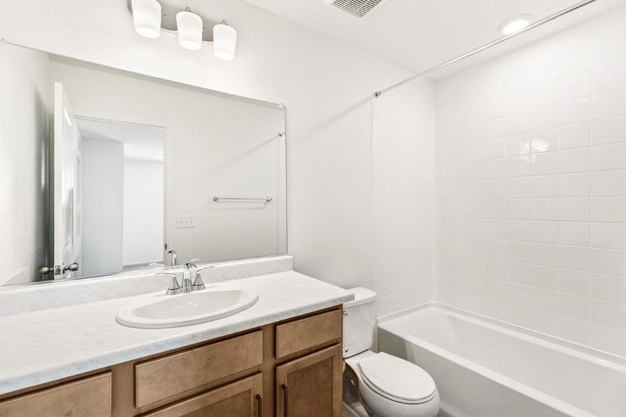 Furnished interior view inside a new home in Sky Ranch Villas, Watkins (Image 11).