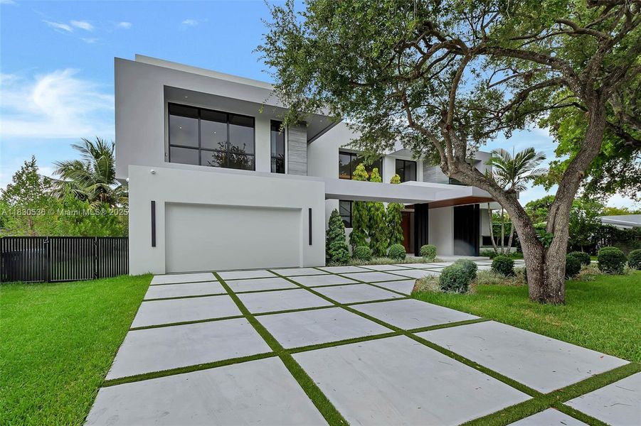 Front exterior of a new home in , Pinecrest, FL, highlighting curb appeal (Image 25).