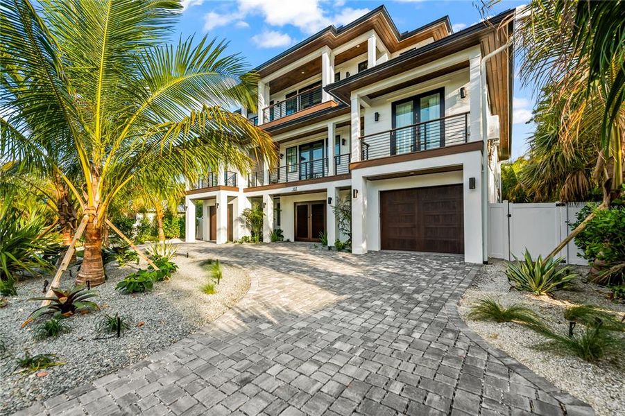 Front exterior of a new home in , Anna Maria, FL, highlighting curb appeal (Image 22).