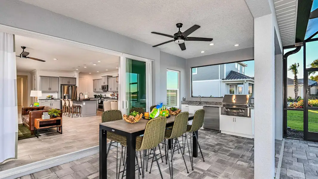 Exterior details and patio area of a home in Verandah Real Estate and Homes for Sale in Fort Myers, FL - Neal Communities, Fort Myers (Image 2).