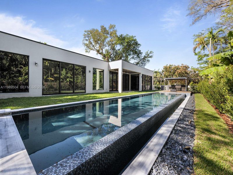 Exterior details and patio area of a home in , South Miami (Image 19).