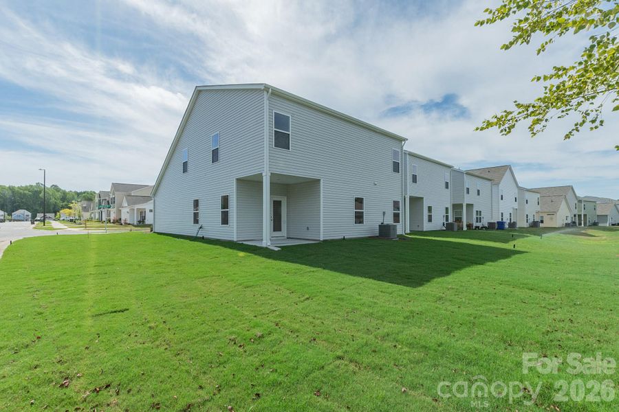 Exterior details and patio area of a home in Country Club Village, Salisbury (Image 4).