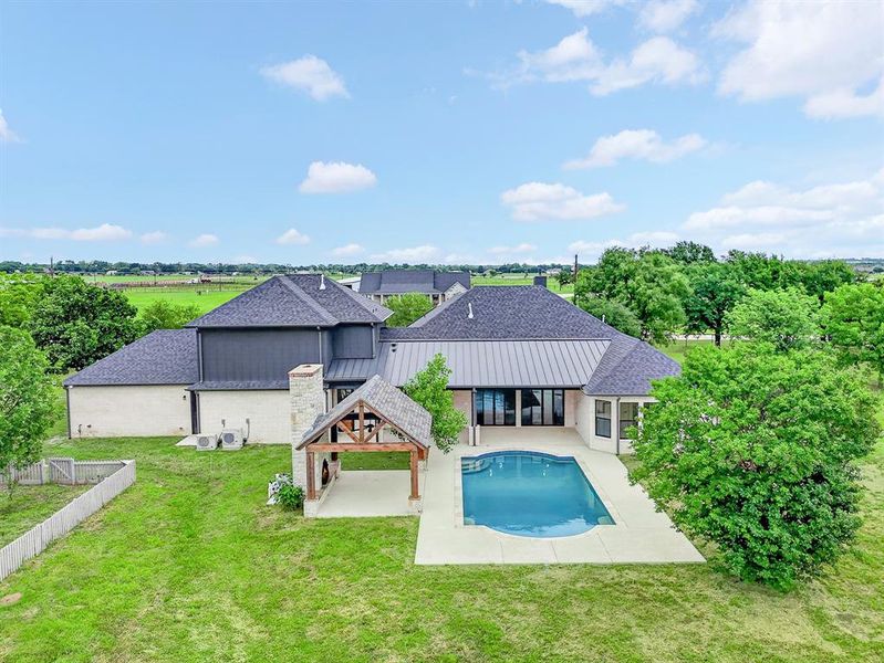 Gorgeous Outdoor pool with covered living space!