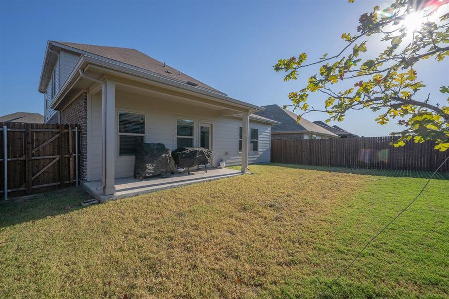 Exterior details and patio area of a home in Briarwood Hills - Highland Series, Forney (Image 4). Exterior details and patio area of a home in Briarwood Hills - Highland Series, Forney (Image 4).