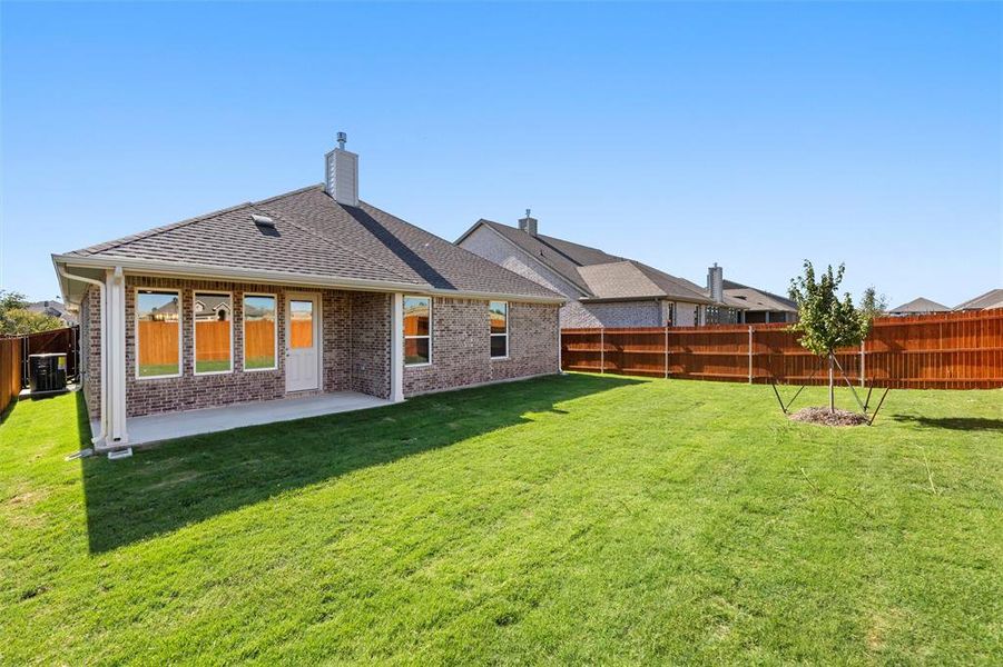 Exterior details and patio area of a home in Morningstar, Aledo (Image 4).