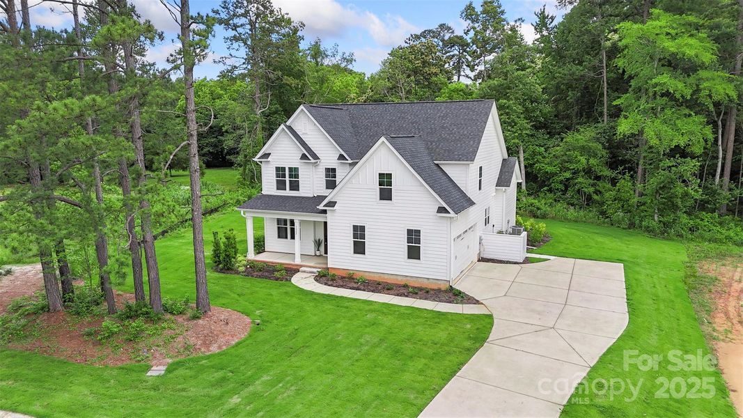 Front exterior of a new home in Crescent Golf, Salisbury, NC, highlighting curb appeal (Image 1).