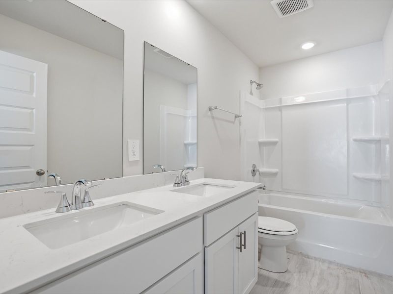 Furnished interior view inside a new home in Brayfield Manor - Heritage Collection, Wellford (Image 8).