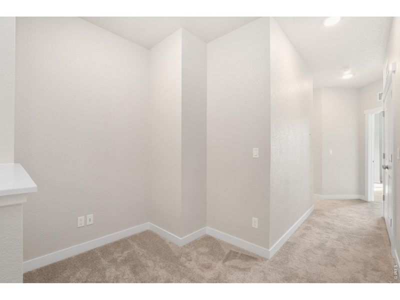 Spacious, unfurnished interior of a new home in The Lakes at Centerra - Discovery, Loveland (Image 11).