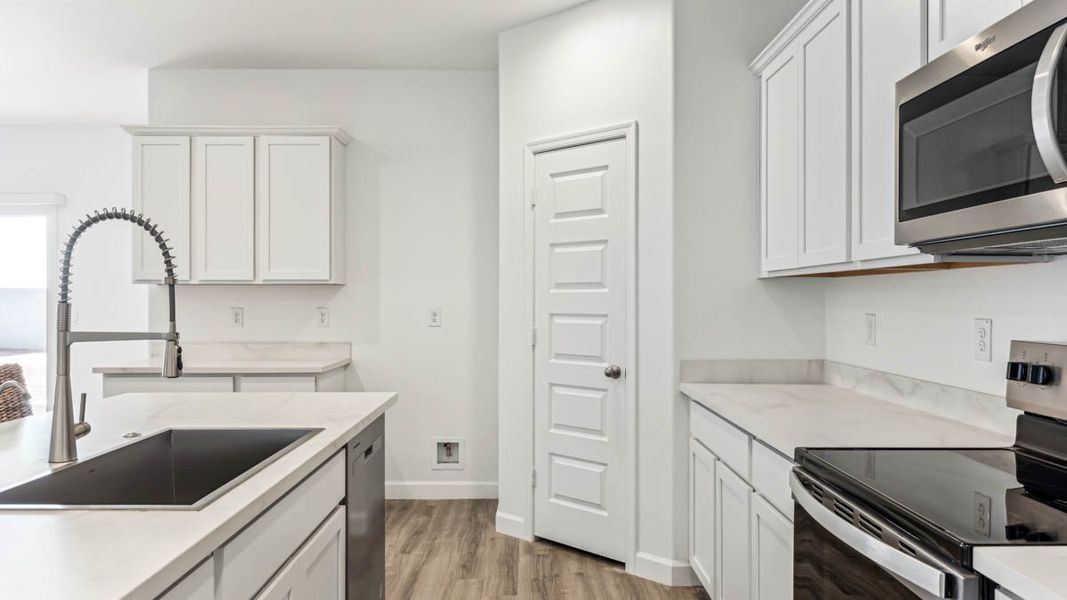 Representative furnished interior of a home built from the Irving by D.R. Horton in Quail Ranch, San Tan Valley (Image 12).