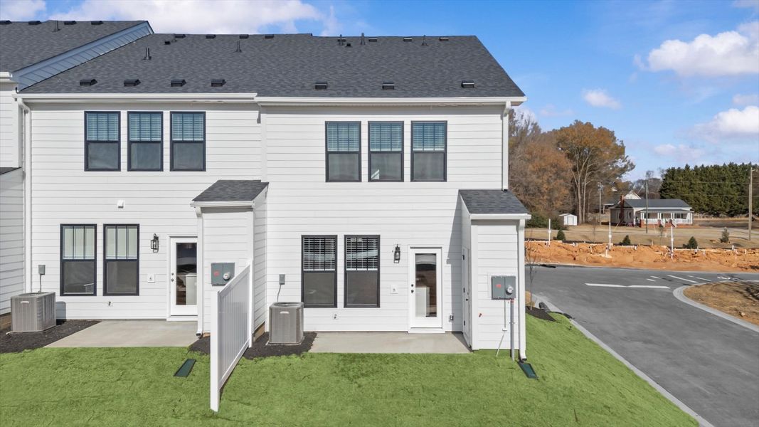 Exterior details and patio area of a home in Gresham Station, Simpsonville (Image 3).