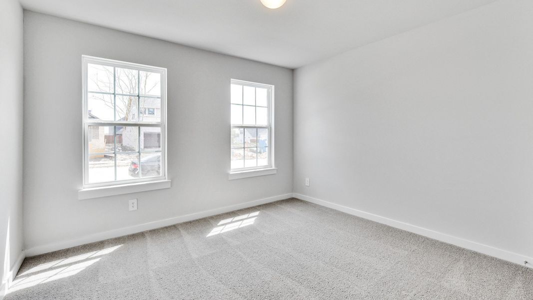 Representative furnished interior of a home built from the Meyerson by Brightland Homes in Sunterra, Katy (Image 9).