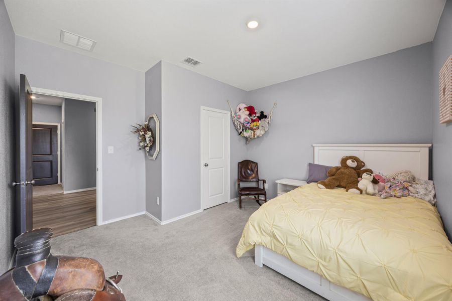 Bedroom 4 featuring carpet and baseboards Bedroom 4 featuring carpet and baseboards