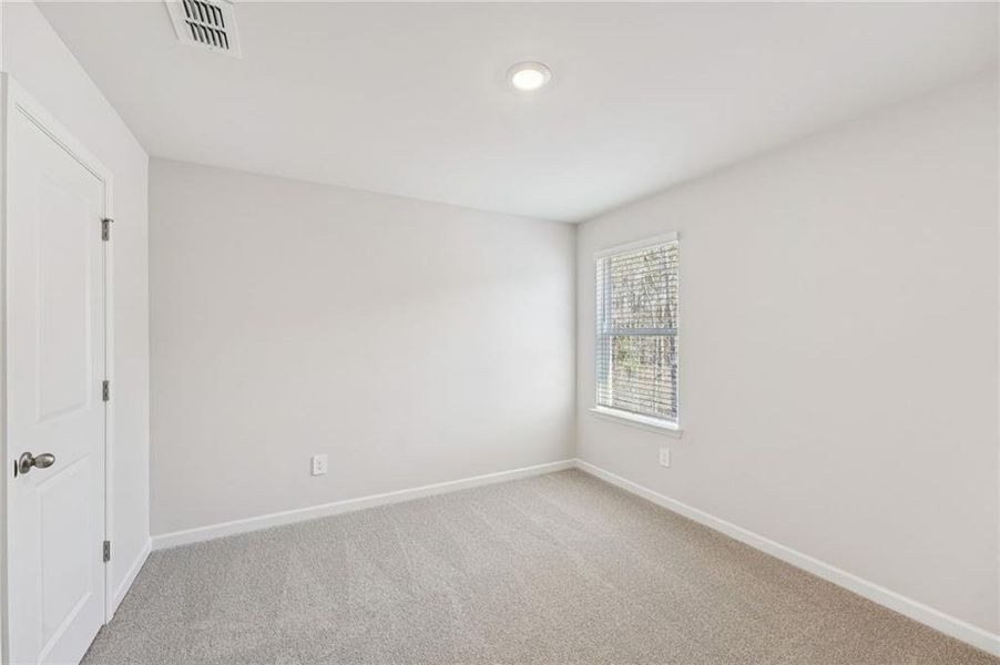 Spacious, unfurnished interior of a new home in Creekside at Oxford Park, Fairburn (Image 45).