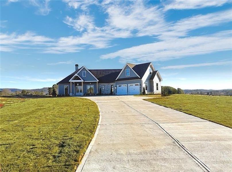 Front exterior of a new home in , Rydal, GA, highlighting curb appeal (Image 28). Front exterior of a new home in , Rydal, GA, highlighting curb appeal (Image 28).