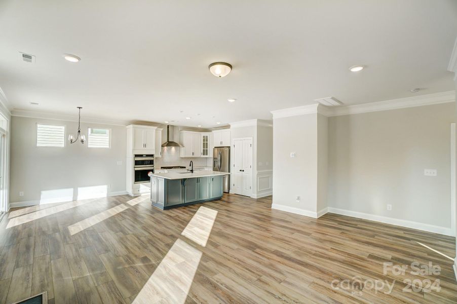 This home features all white cabinets and island