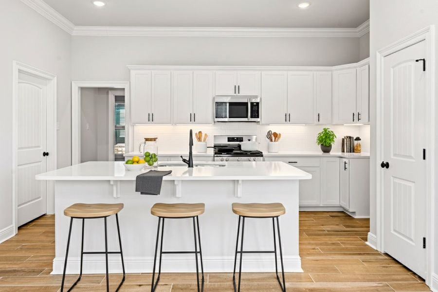 Front exterior of a new home in The Bluffs at Lafayette, Freeport, FL, highlighting curb appeal (Image 2).