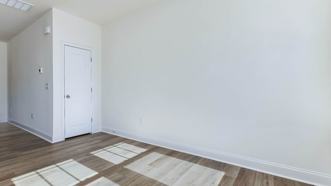 Furnished interior view inside a new home in Battle Bridge, Raleigh (Image 18).