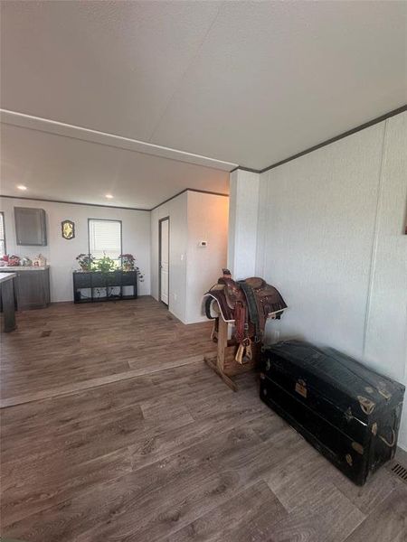 Sitting room with dark wood finished floors Sitting room with dark wood finished floors