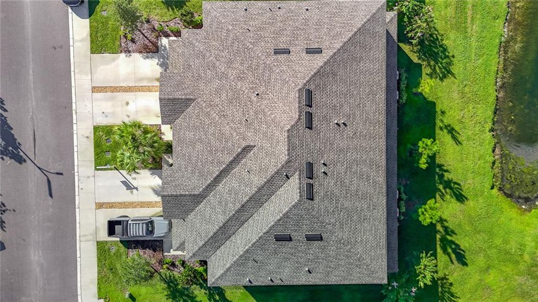 Exterior details and patio area of a home in , Land O' Lakes (Image 28).