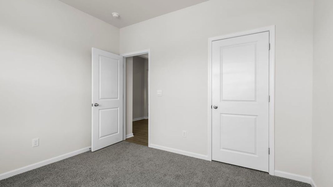 Spacious, unfurnished interior of a new home in Durbin Meadows Traditions, Fountain Inn (Image 15).