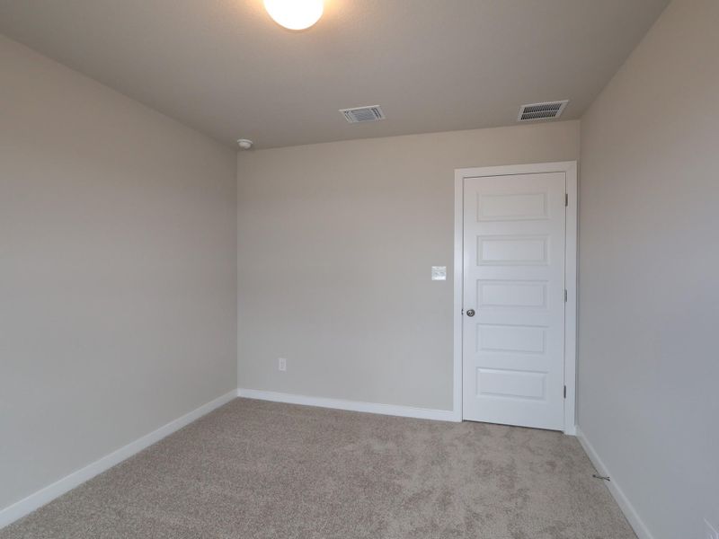 Spacious, unfurnished interior of a new home in Heritage, Dripping Springs (Image 10).