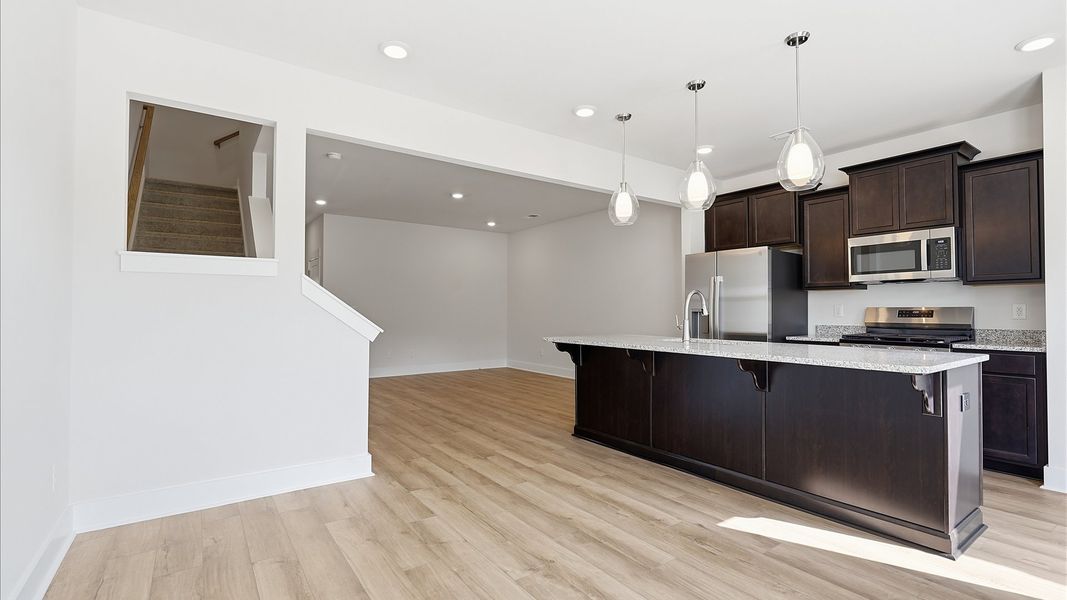 Light-filled breakfast area offering a comfortable space to gather and unwind located near Downtown Greenville