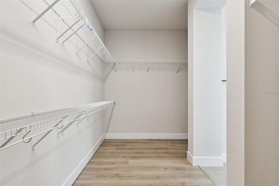 Spacious, unfurnished interior of a new home in Emerald Landing at Waterside at Lakewood Ranch – Lake Series, Sarasota (Image 23).