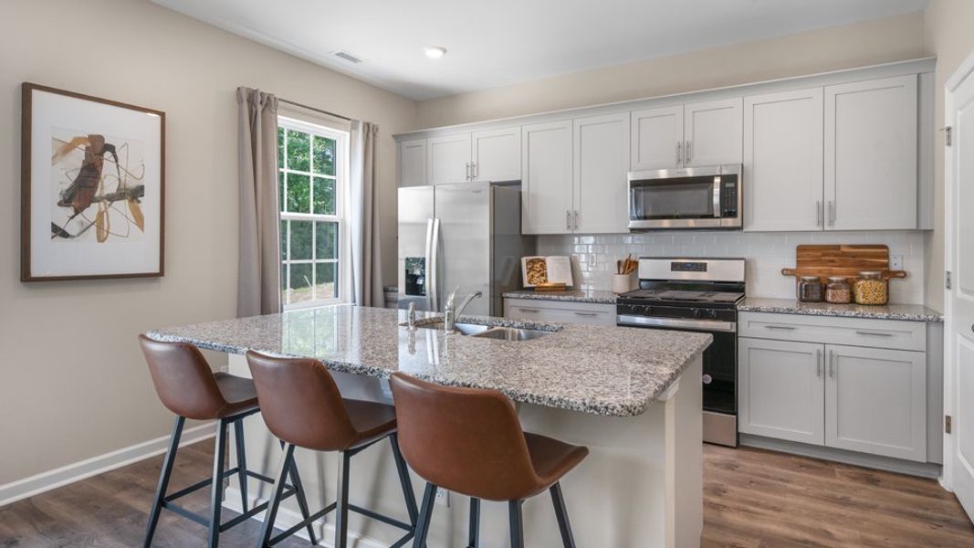 Furnished interior view inside a new home in The Preserve at Kinsley, Jamestown (Image 9).