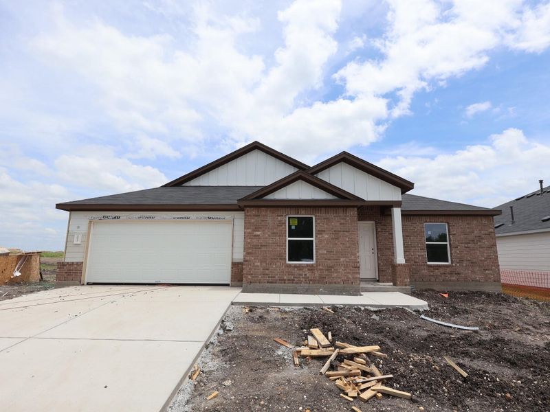In-progress construction of a new home in Carillon, Manor, TX (Image 4).