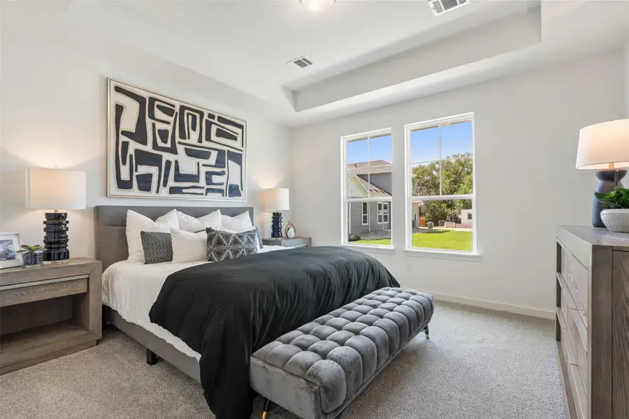 Downstairs primary suite ** Photo of Model Home, not actual Home** Downstairs primary suite ** Photo of Model Home, not actual Home**