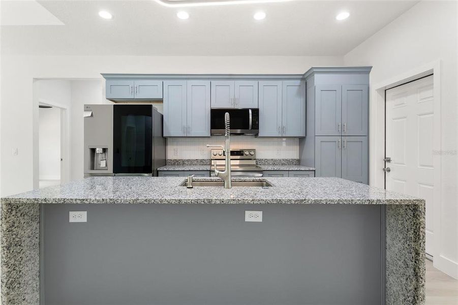 Furnished interior view inside a new home in , Indian Lake Estates (Image 8).