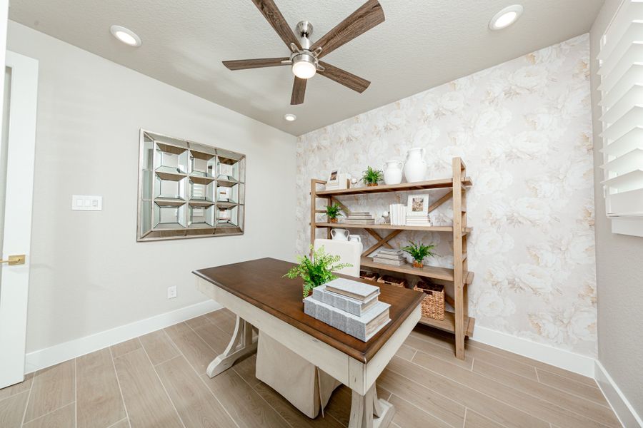 Furnished interior view inside a new home in Ellwood, Iowa Colony (Image 7).