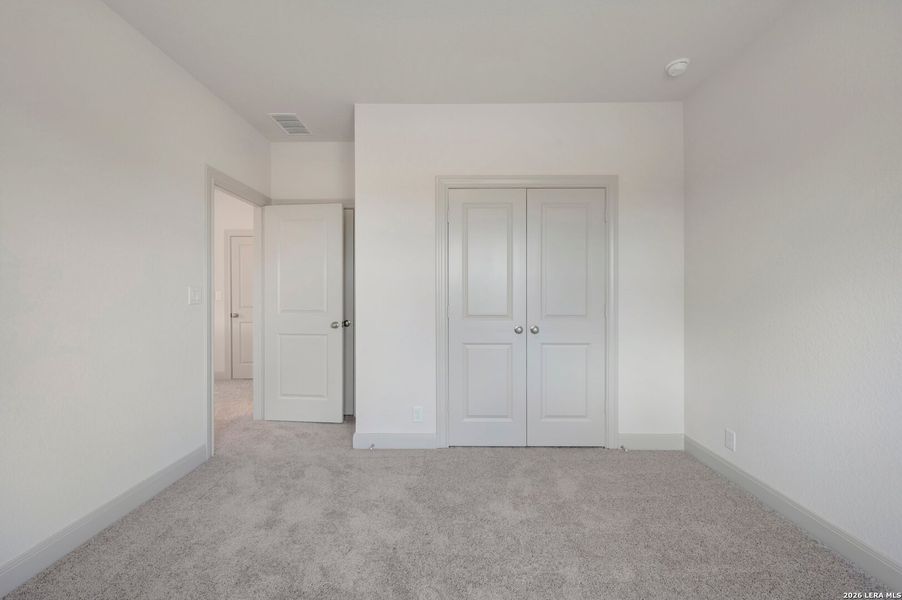 Spacious, unfurnished interior of a new home in Windsong - Legacy Series, Boerne (Image 42).