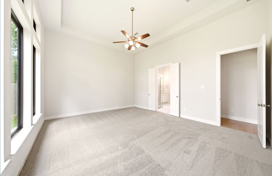 Spacious, unfurnished interior of a new home in The Woodlands Hills 65′, Willis (Image 51).