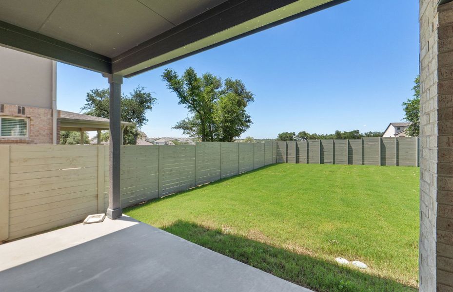 Exterior details and patio area of a home in Wolf Ranch, Georgetown (Image 30).