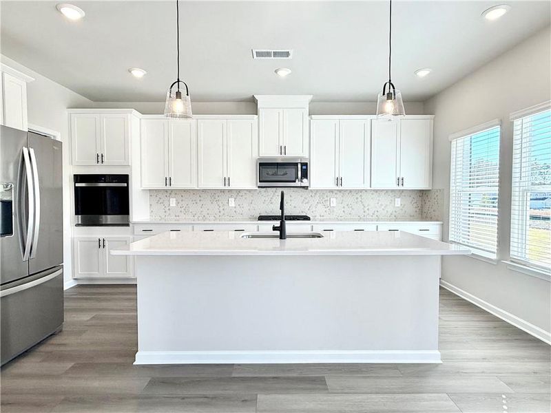 Furnished interior view inside a new home in Vines at Mill Creek - Estate Series, Braselton (Image 11). Furnished interior view inside a new home in Vines at Mill Creek - Estate Series, Braselton (Image 11).