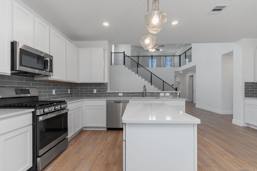 Enjoy effortless flow from the kitchen into the spacious family room, making gatherings and everyday moments easy and enjoyable. With upscale finishes, natural light, and modern open-concept living, this space truly brings everyone together in comfort and style. Enjoy effortless flow from the kitchen into the spacious family room, making gatherings and everyday moments easy and enjoyable. With upscale finishes, natural light, and modern open-concept living, this space truly brings everyone together in comfort and style.