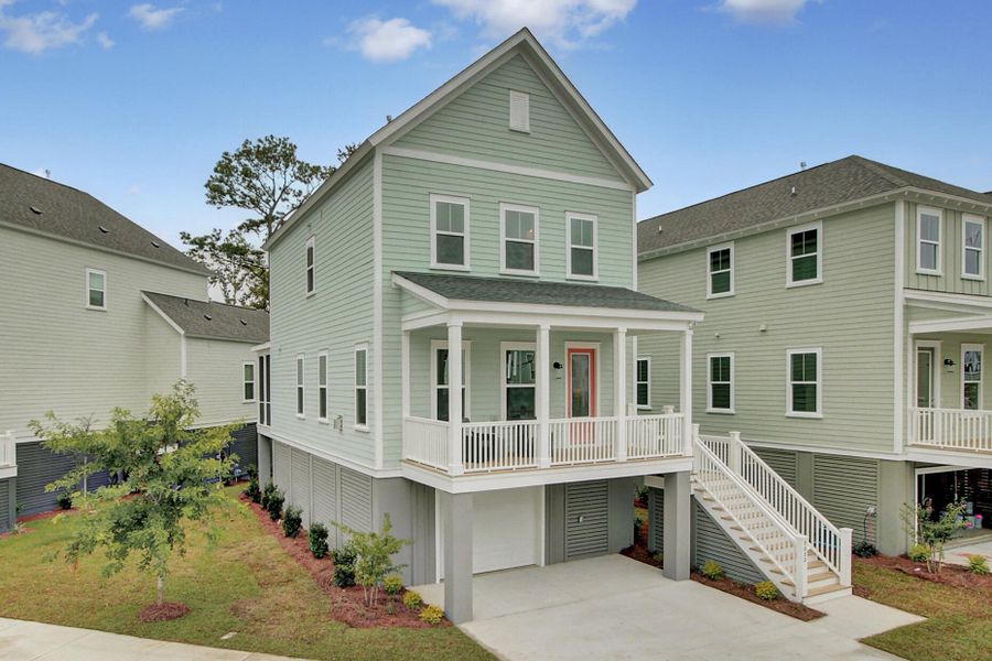 Front exterior of a new home in , Johns Island, SC, highlighting curb appeal (Image 1). Front exterior of a new home in , Johns Island, SC, highlighting curb appeal (Image 1).