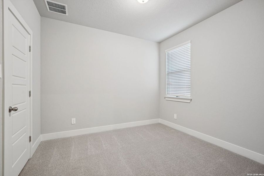 Spacious, unfurnished interior of a new home in Estancia Ranch - Premier Series, San Antonio (Image 25).