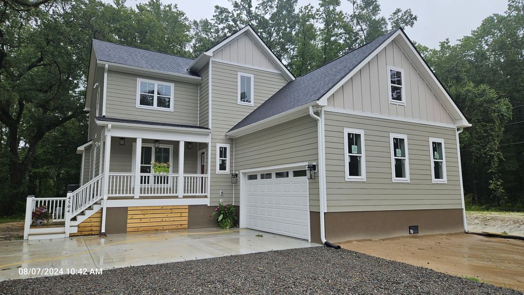 Front exterior of a new home in , Meggett, SC, highlighting curb appeal (Image 8).