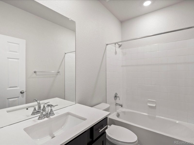 Furnished interior view inside a new home in Poudre Heights: The Alpine Collection, Windsor (Image 6).