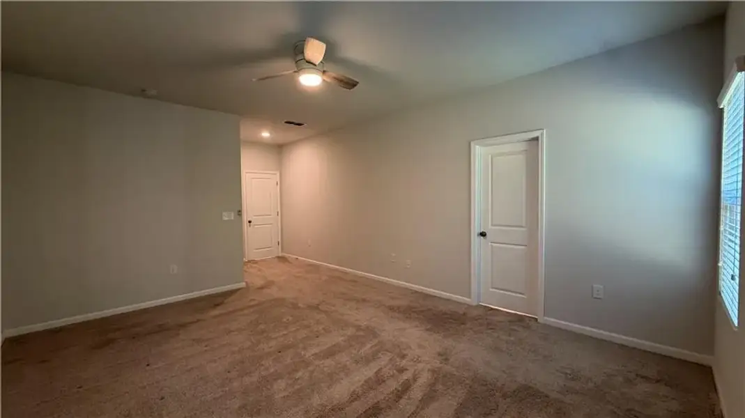 Spacious, unfurnished interior of a new home in Graystone Village, Grayson (Image 22).