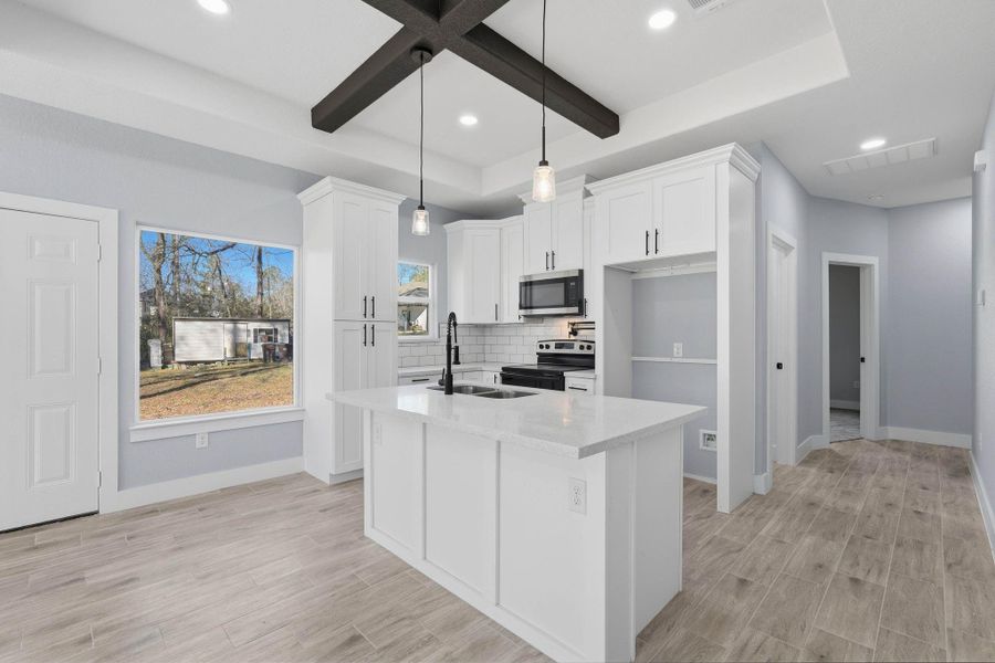 Furnished interior view inside a new home in , Willis (Image 7).