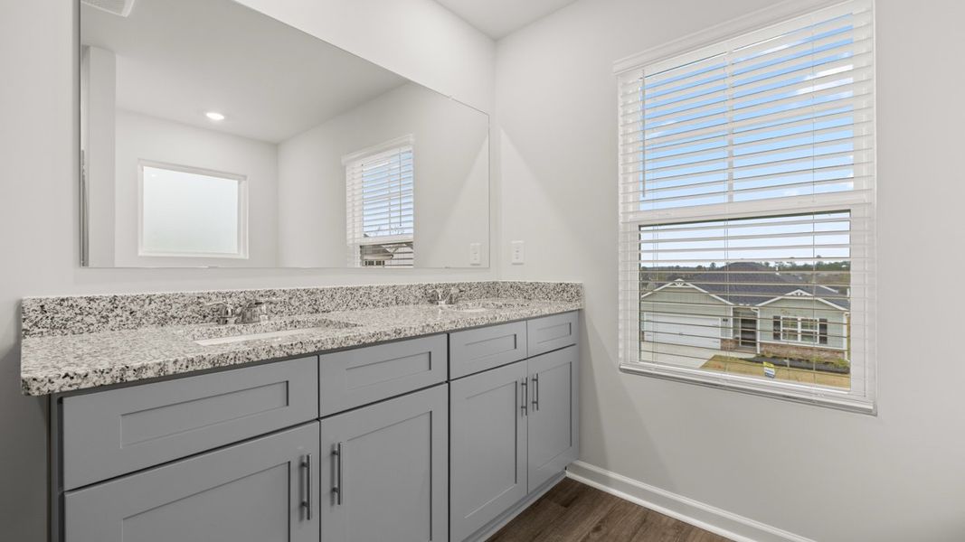 Representative furnished interior of a home built from the Halton by D.R. Horton in Highland Hills, Graniteville (Image 10).