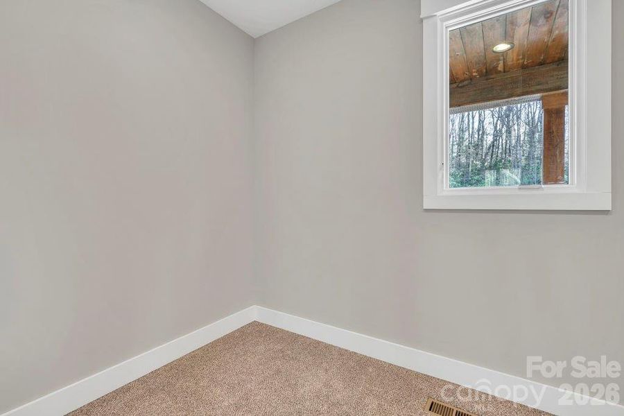 Primary suite walk-in closet Primary suite walk-in closet