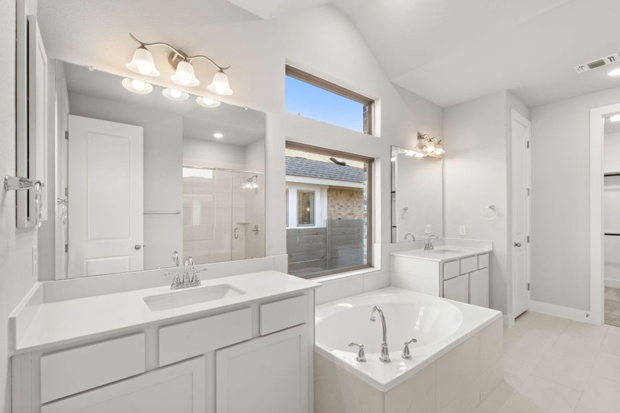 Dual Vanities & Garden Tub in Primary Bath