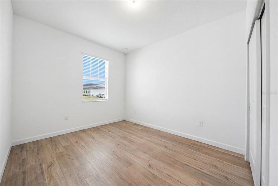 Spacious, unfurnished interior of a new home in The Timbers at Everlands, Palm Bay (Image 24).