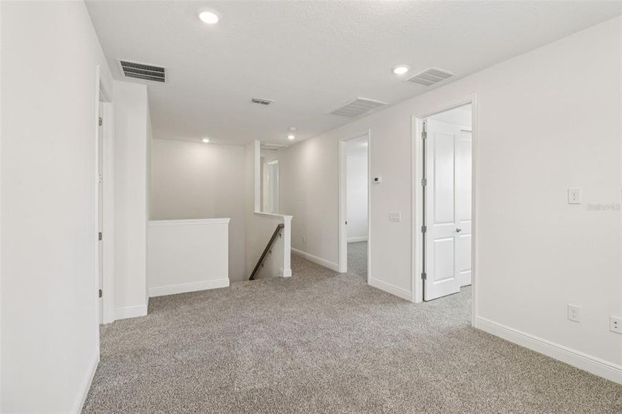 Spacious, unfurnished interior of a new home in Legends Preserve - Signature Series, Daytona Beach (Image 27).