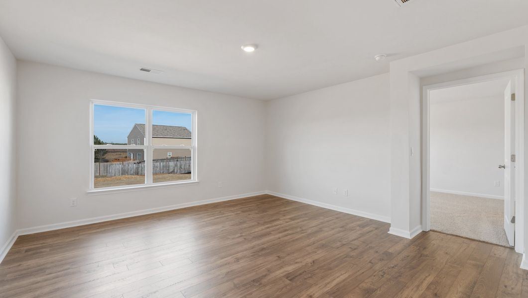 Representative unfurnished interior of a home built from the CALI by D.R. Horton in Waverly Station, Greenwood (Image 18).