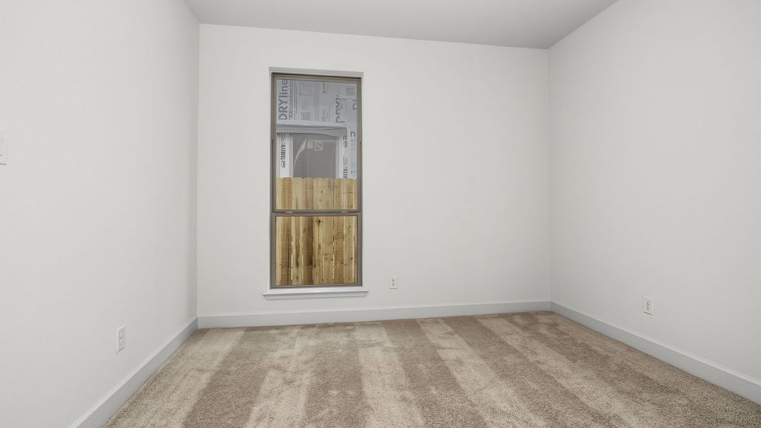 Spacious, unfurnished interior of a new home in Lakes of Cane Island, Katy (Image 22).